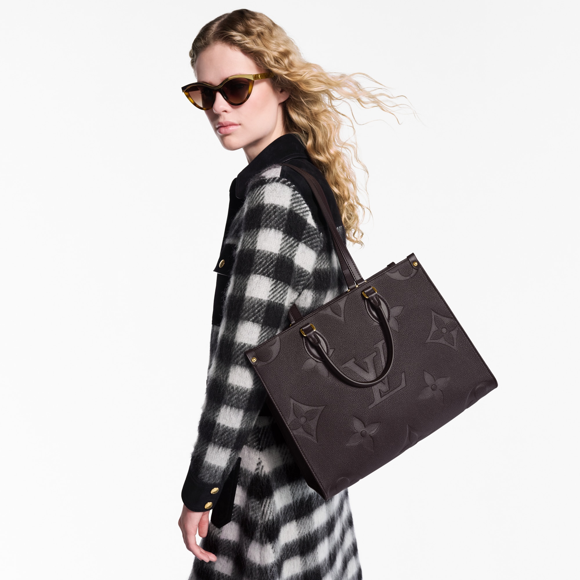Borsa tote OnTheGo MM Pelle Monogram Empreinte Donna Borse da Donna All Collections | LOUIS VUITTON (Zoom prodotto)
