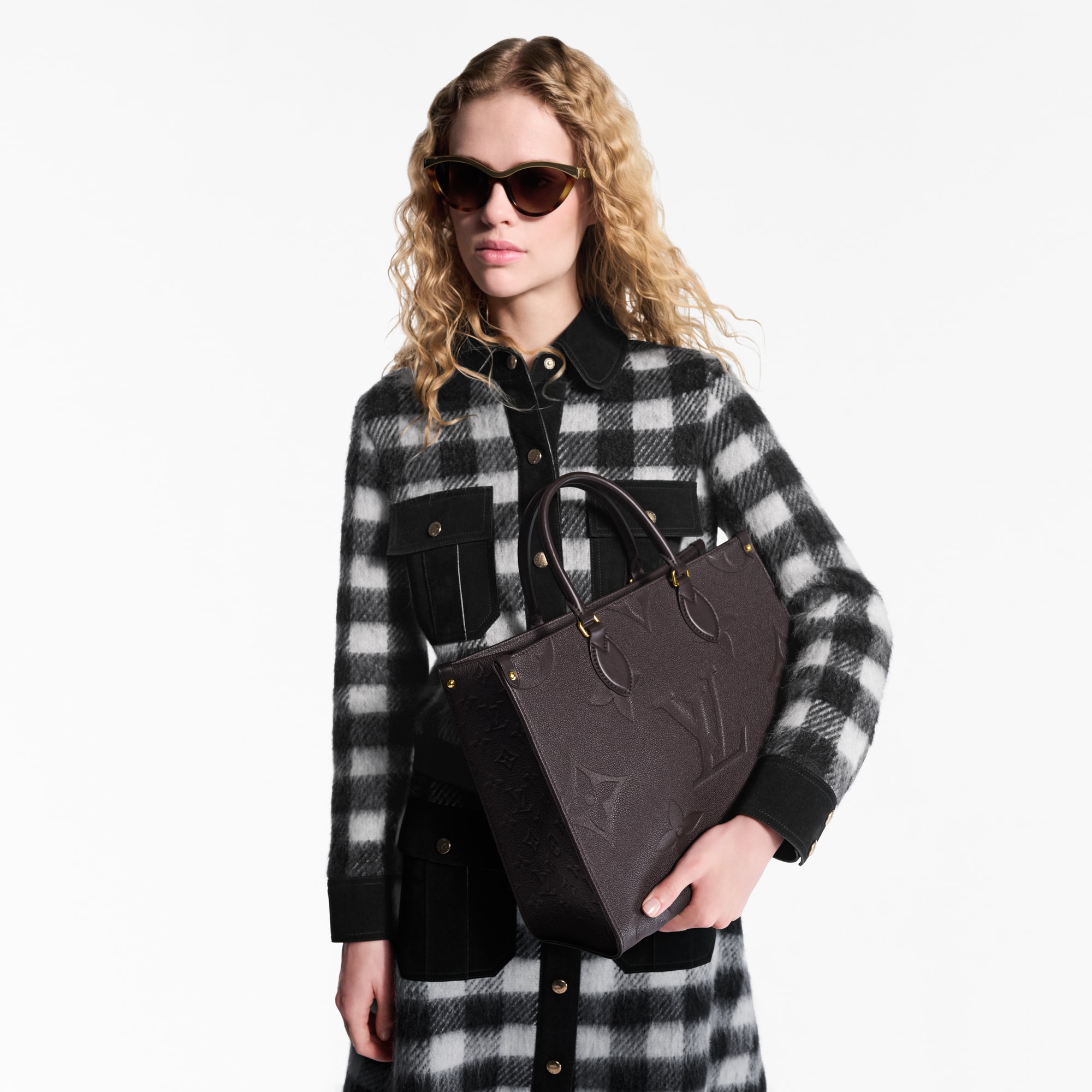 Borsa tote OnTheGo MM Pelle Monogram Empreinte Donna Borse da Donna All Collections | LOUIS VUITTON (Zoom prodotto)