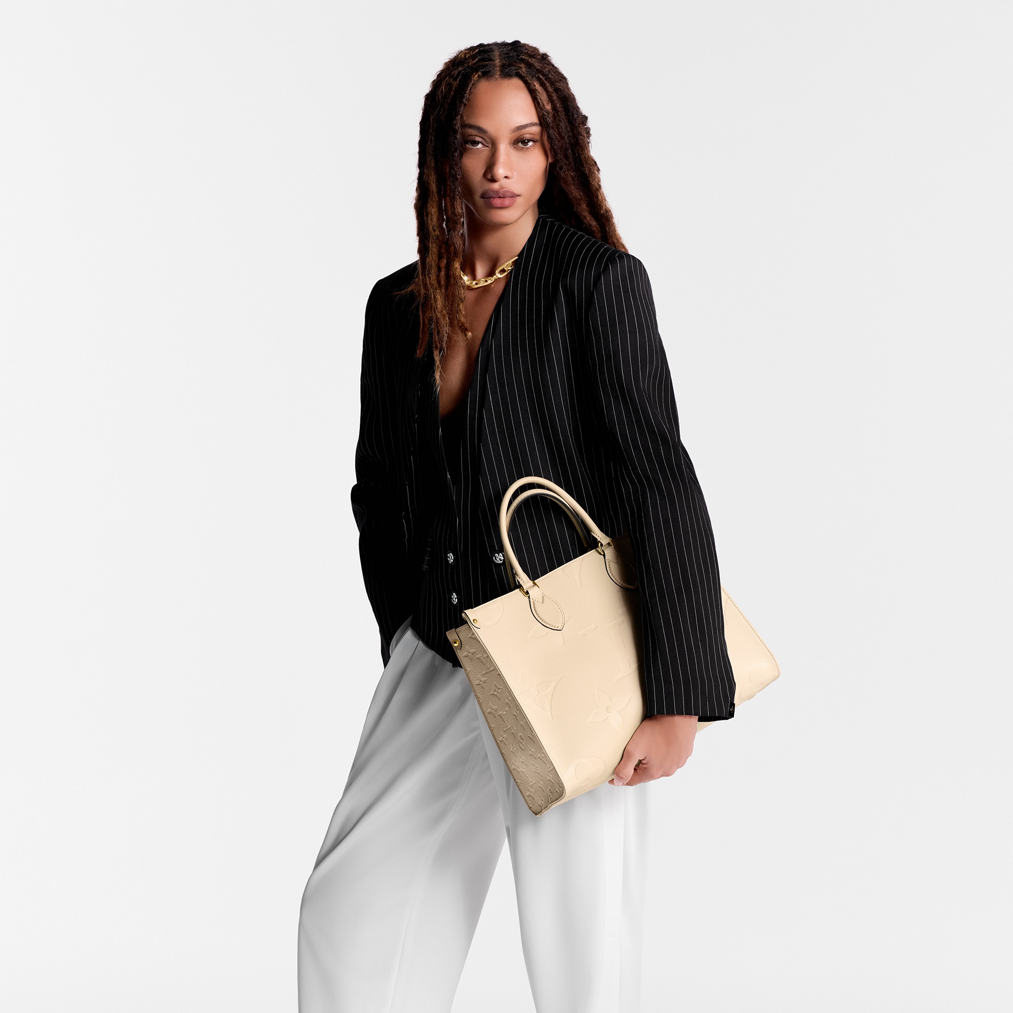 Borsa tote OnTheGo MM Pelle Monogram Empreinte Donna Borse da Donna Tutte le collezioni | LOUIS VUITTON (Zoom prodotto)