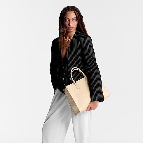 Borsa tote OnTheGo MM Pelle Monogram Empreinte Donna Borse da Donna Tutte le collezioni | LOUIS VUITTON (Zoom prodotto)