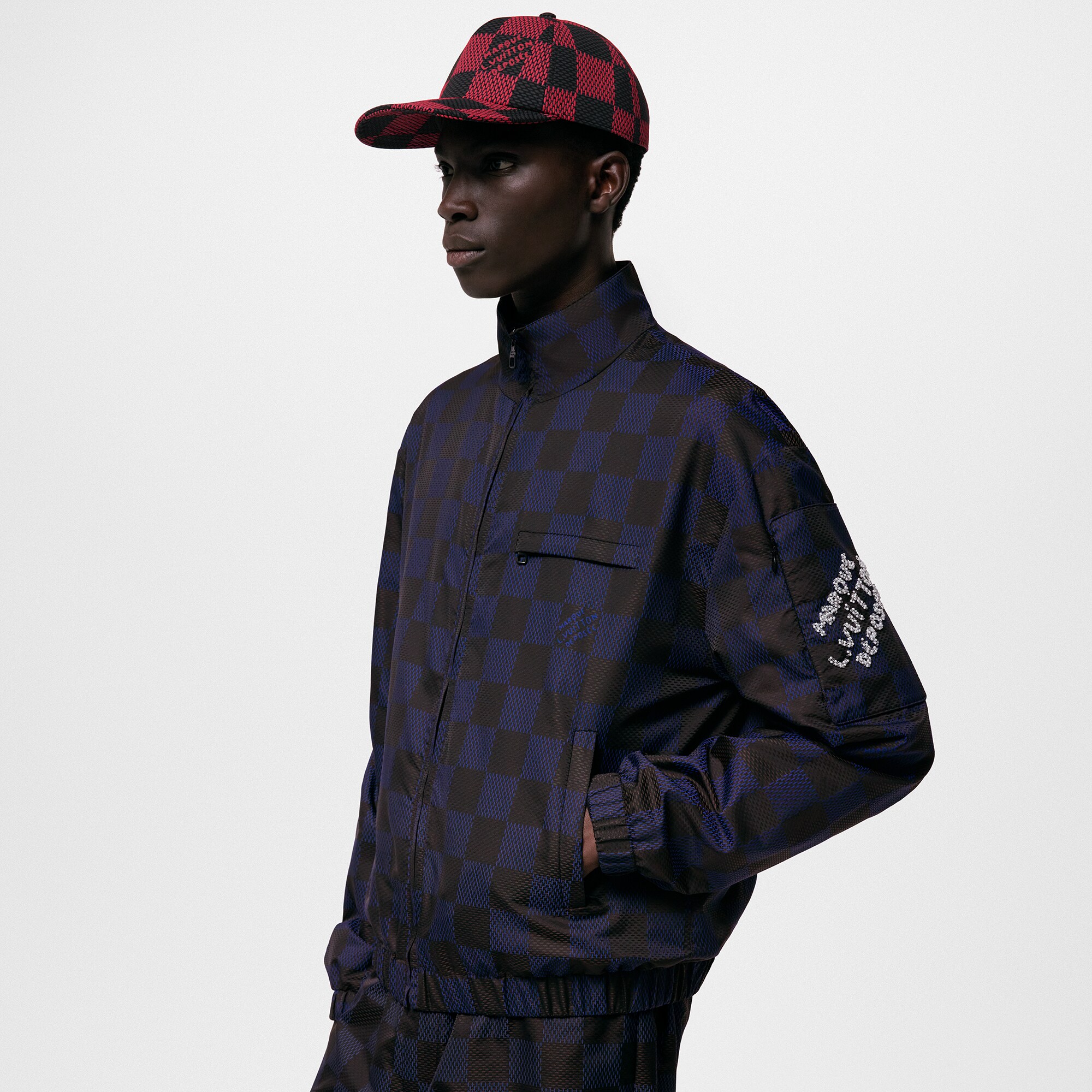 Giubbotto in nylon con motivo Damier Pop Travel Kit  Uomo Abbigliamento Capispalla e Cappotti | LOUIS VUITTON (Zoom prodotto)