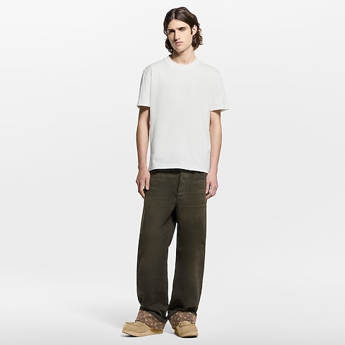 Pantaloni in denim cerato con iconici risvolti Uomo Abbigliamento Collezione Denim | LOUIS VUITTON (Zoom prodotto)