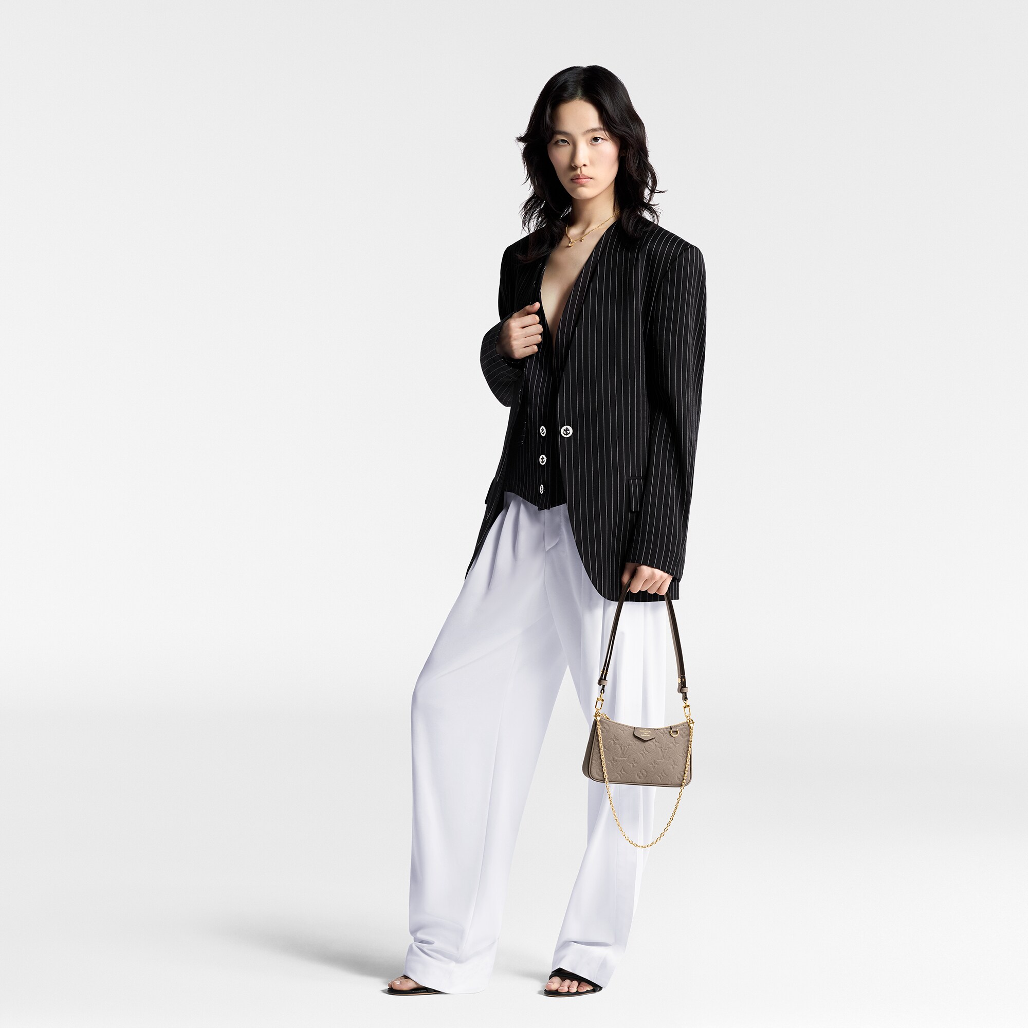 Pochette Easy Pouch On Strap Pelle Monogram Empreinte Donna Portafogli e Piccola Pelletteria Tutti i Portafogli e Piccola Pelletteria | LOUIS VUITTON (Zoom prodotto)