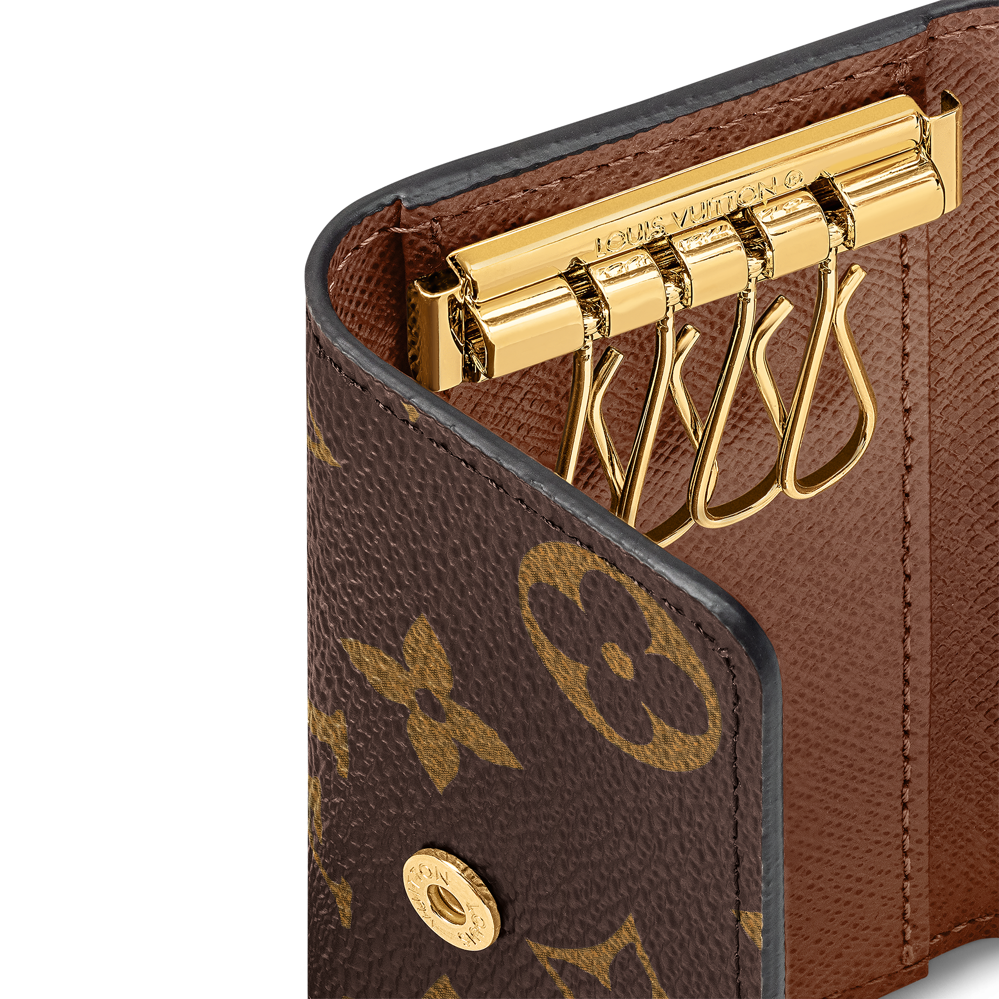 Portachiavi a 4 gancetti Tela Monogram Donna Portafogli e Piccola Pelletteria Tutti i Portafogli e Piccola Pelletteria | LOUIS VUITTON (Zoom prodotto)