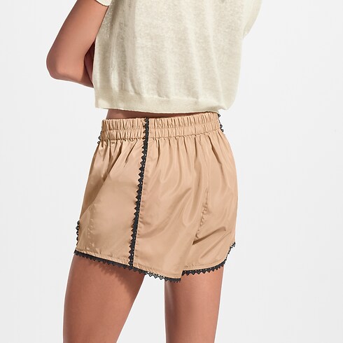 Shorts da jogging con finiture in pizzo Donna Collezione High Summer } | LOUIS VUITTON (Zoom prodotto)